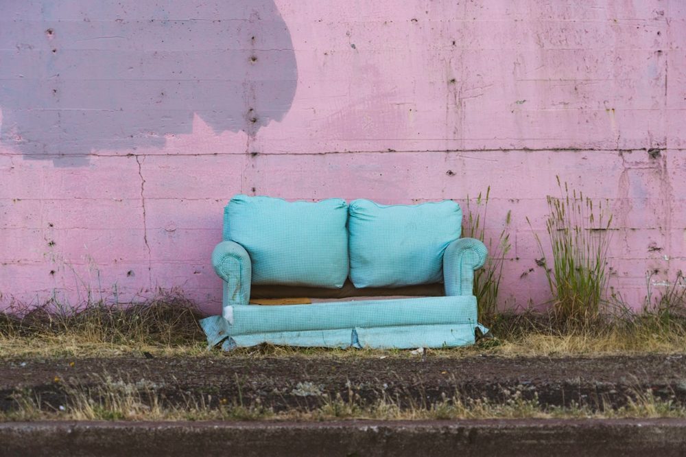 Old couch set out for furniture removal
